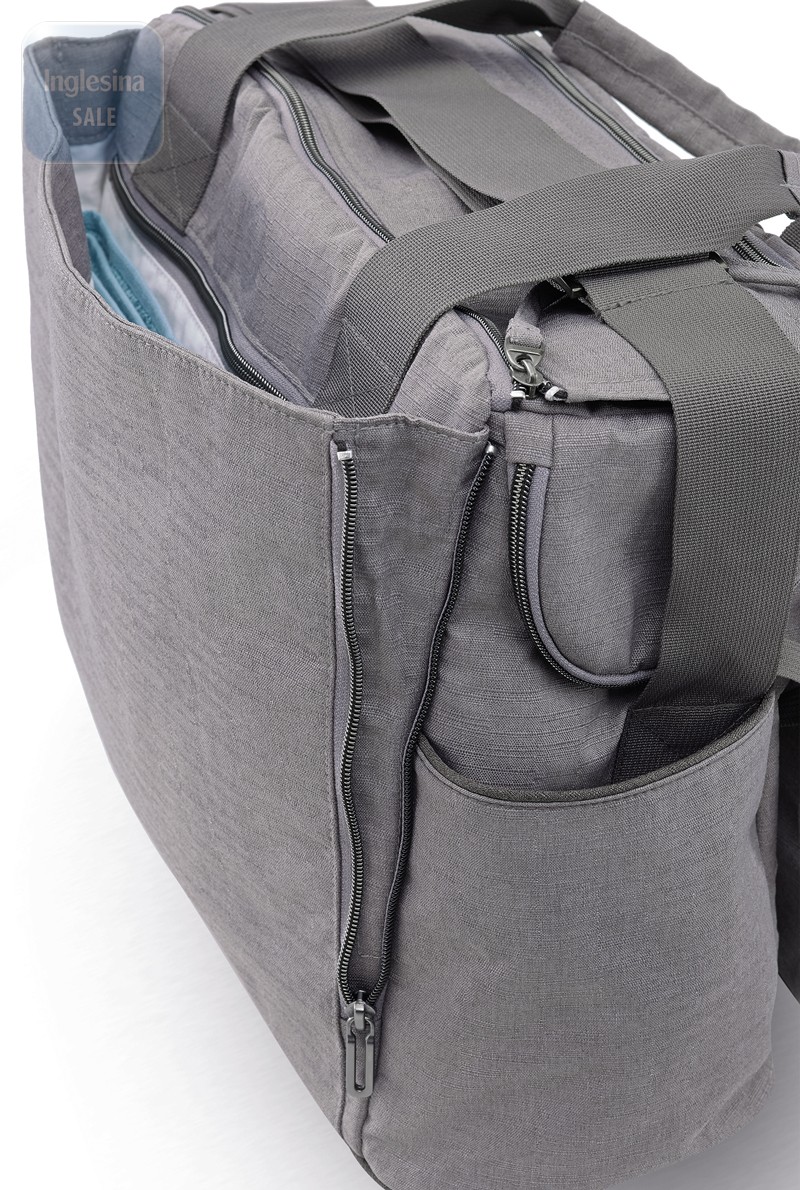 Наружный карман сумки Inglesina Dual Bag снабжен магнитным замком